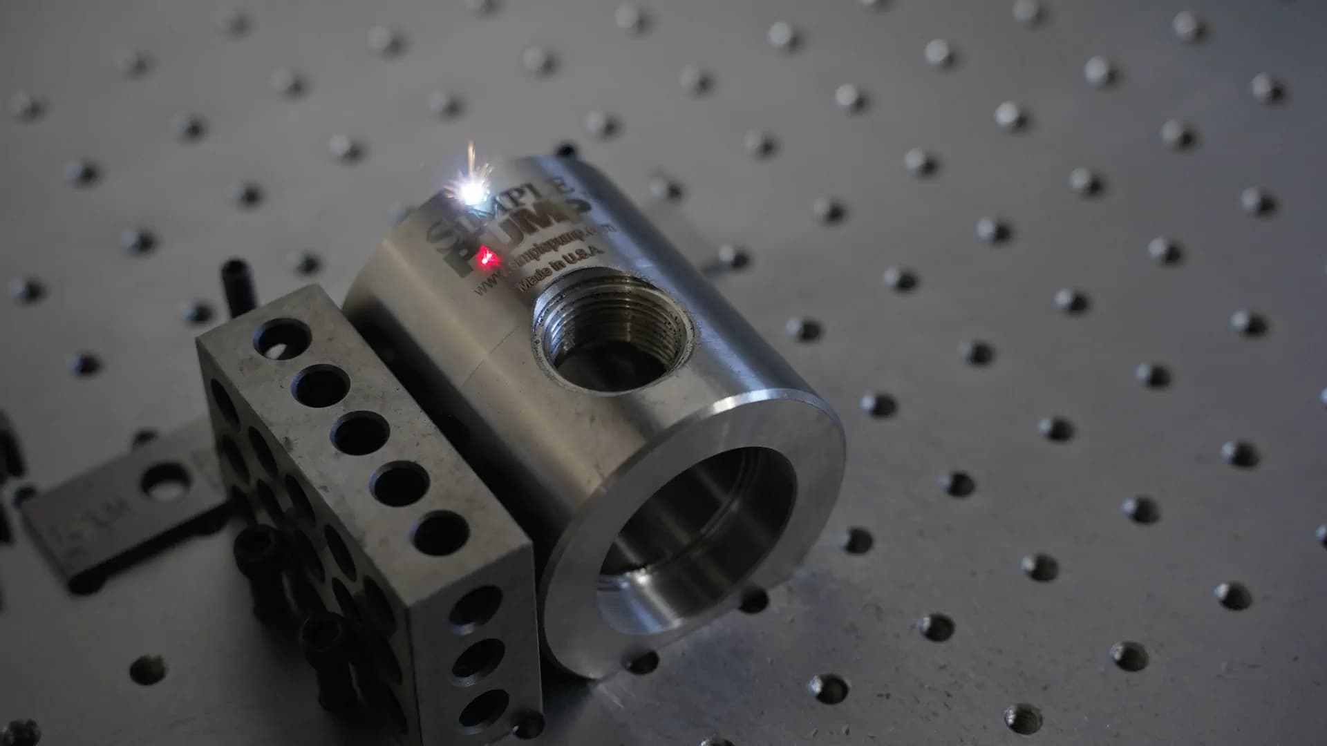 Precision laser etching of Simple Pump head during manufacturing process